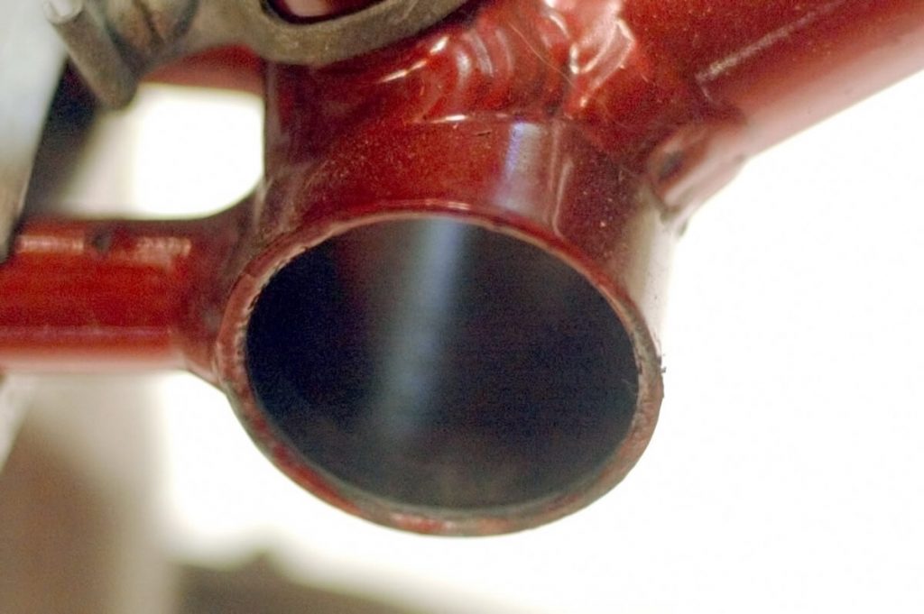 Red Royal Enfield Revelation bicycle bottom bracket.